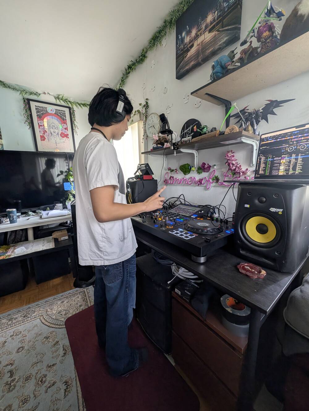 A DJ mid-set at the decks in the Honeybun studio